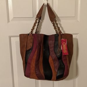 ✨SOLD✨🔥NWT  Carlos Santana purse 🔥✨